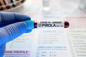 Blood sample test labeled with New Variant covid-19 PIROLA. Blood Analysis of Coronavirus Positive...