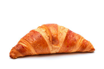 Crispy croissant on a white background close-up. Homemade baking