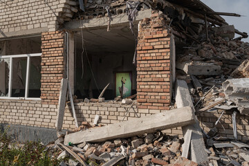 Fragment of the destroyed school after being hit by a Russian missile. A fragment mural of a...