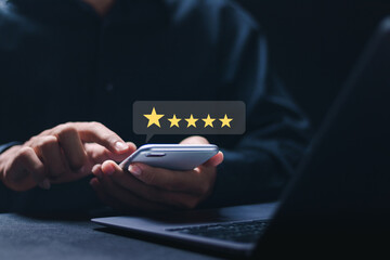 Customer satisfaction service concept. Businessman rate 5-star satisfaction on online application. satisfaction feedback review, good quality most. - obrazy, fototapety, plakaty