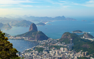 Amazing brazilian landscape, Rio de Janeiro cityscape and its natural landmark seen from above, sugarloaf mountain and the city beaches