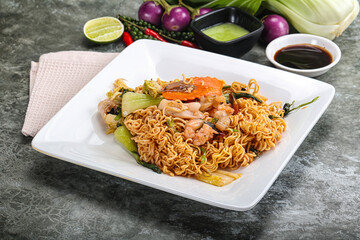 Asian cuisine - Fried noodles with seafood