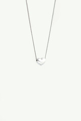 Silver pendant on a white background