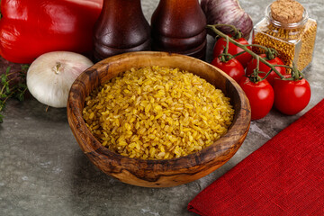 Dry wheat bulgur cereal heap