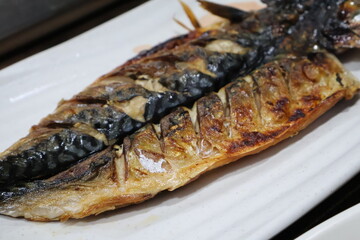 Korean food. Grilled mackerel on a plate