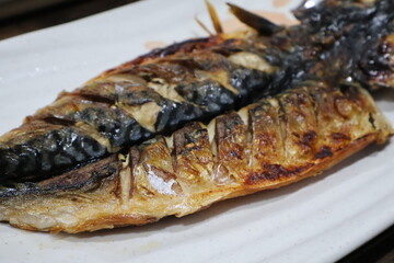 Korean food. Grilled mackerel on a plate