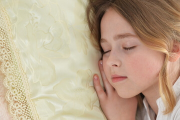 Adorable cute little girl sleeping in bed
