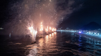 aerial image, made with a drone, of the fireworks display at Copacabana Beach, in Rio de Janeiro,...