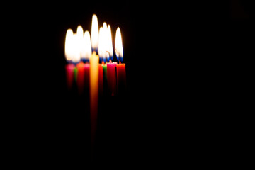 burning  candles on black background