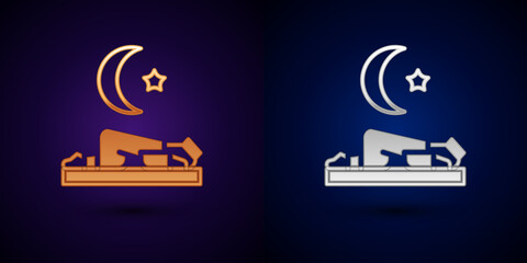 Gold and silver Muslim man prays on the carpet icon isolated on black background.  Vector