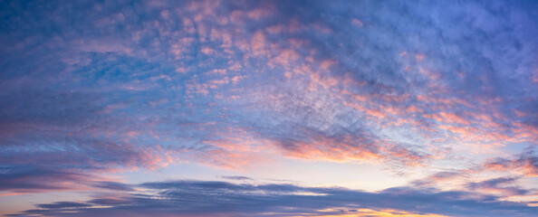 Beautiful Evening Sky with clouds glowing at sunset - obrazy, fototapety, plakaty