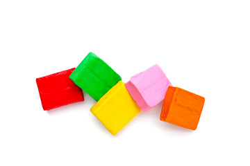 Colorful plasticine clay on white background.