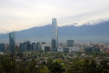 Panoramic view of the Chilean capital Santiago de Chile with the Gran Torre Santiago skyscraper and the Andes in the background