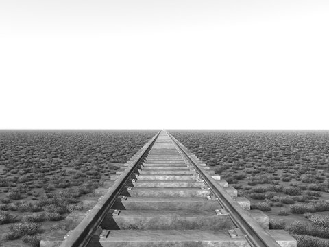 Schienenstrang in einer Landschaft in Schwarz und Weiß