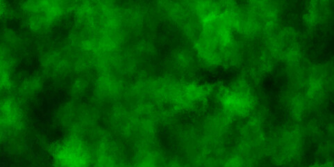Colorful smoke on a black background,Green smoke in dark background. Blackhole Texture and desktop,abstract green background,