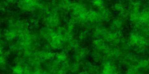 Colorful smoke on a black background,Green smoke in dark background. Blackhole Texture and desktop,abstract green background,