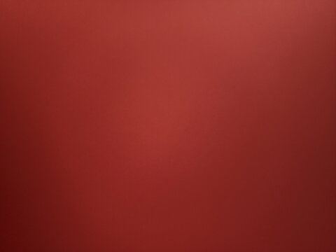Red background, Dark red textured wall background, Empty red textured wall close up with shadows. Black red background with space for design. 
