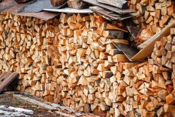 Preparation of firewood for the winter. firewood background
