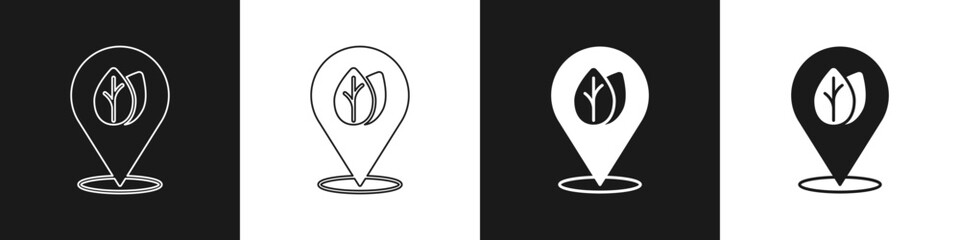 Set Location pin with leaf inside icon isolated on black and white background. Leaves sign. Fresh natural product symbol.  Vector
