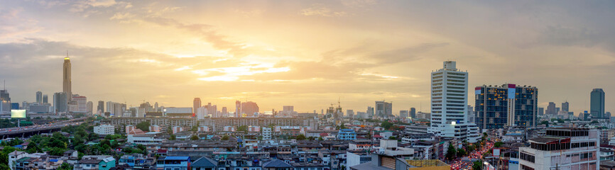 Panorama aerial view of Bangkok city on sunset in Thailand. Cityscape of buildings and urban architecture