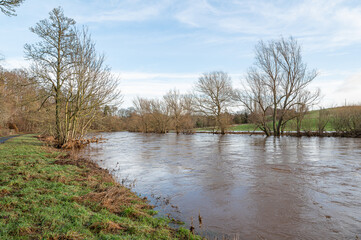 Fototapeta na wymiar Teviot River flooding after storm Gerrit in December 2023, Scottish Borders, UK