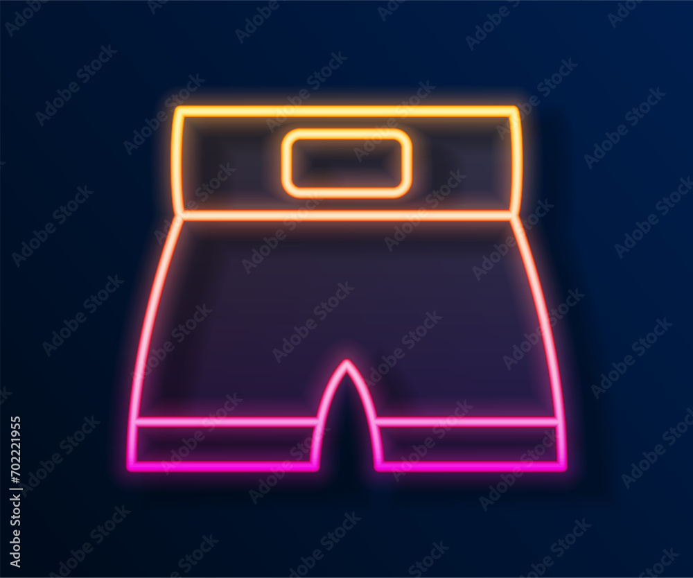 Sticker Glowing neon line Boxing short icon isolated on black background.  Vector