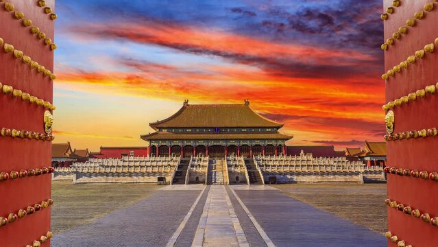 Ancient royal palace of the Forbidden City in Beijing, China. Historic ancient buildings at sunset. 4k time lapse video.
