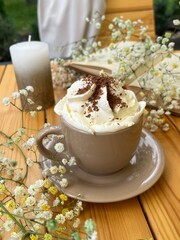 Coffee with cream and sprinkles