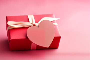 A Valentine's Day gift box with a heart-shaped tag, a festive gift for lovers.