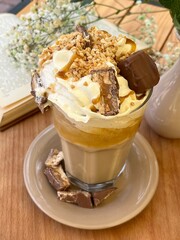 Coffee with Snickers and cream