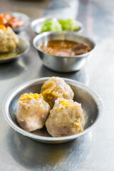 Close up shot of dim sum, served as a snack or main course.
