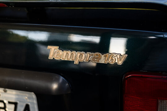 Detail of the logo of a Fiat Tempra 16V car. City of Salvador, Bahia.tire; wheel