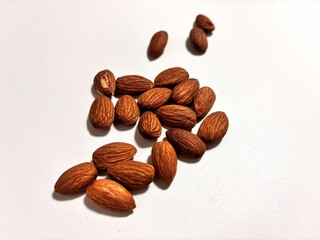 almonds on white background, Photo of roasted healthy almonds