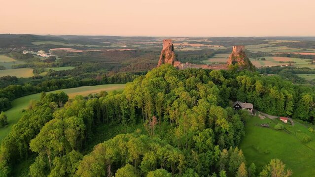 Trosky medieval castle ruins with two ancient towers. Bohemian Paradise, Czech: Cesky raj, Czechia. Aerial 4K footage from above