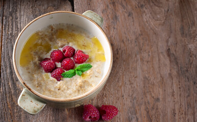 healthy eating cereal porridge with berries for breakfast