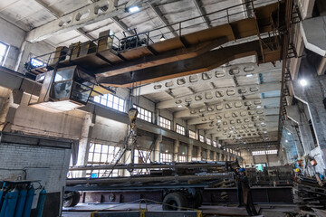 Kyiv, Ukraine - 15.06.2022: Various metal structures cut in the workshop. The factory produces metal parts, elements, and structures. Plant for the production of metal structures.