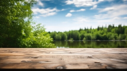 Empty wooden deck with a blurred background of a peaceful lake and lush green forest under a clear sky. - obrazy, fototapety, plakaty