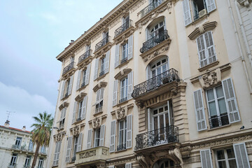 Fototapeta na wymiar Beautiful house with openwork balconies in Nice, France