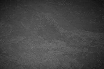 black stone wall background. dark grey texture. dark black stone background.