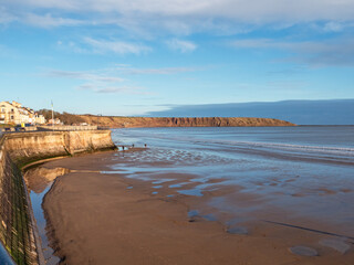 View over Filey beach to Filey Brigg, North Yorkshire, England