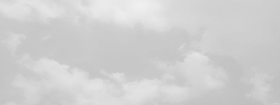 	White cloud in the sky. View on a soft white fluffy cloud as background. Cloudy sky, white clouds, black background pattern. The gray cloud trendy photo. White sky image	
