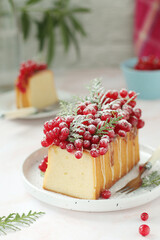 A biscuit decorated with red currant