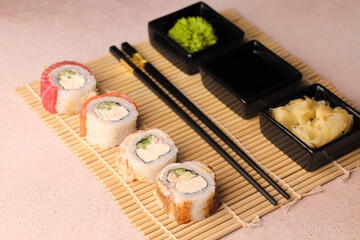 Assorted sushi nigiri and maki big set on slate. A variety of Japanese sushi with tuna, crab, salmon, eel and rolls. Top view