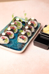 Assorted sushi nigiri and maki big set on slate. A variety of Japanese sushi with tuna, crab, salmon, eel and rolls. Top view