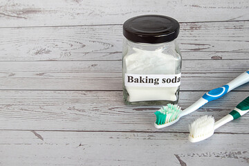 Old toothbrush and baking soda to clean. zero waste concept.	