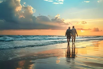 Poster Eternal love. Old mature couple walking on beach at sunset. Romantic getaway. Senior embracing beauty of sunset. Sun kissed moments. Retired enjoying stroll together © Bussakon