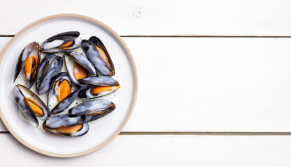Cooked mussels in white cream sauce. Seafood. Healthy eating. Diet.