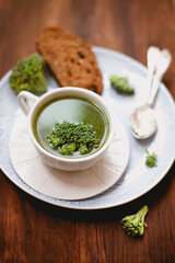 Delicious broccoli soup on the table