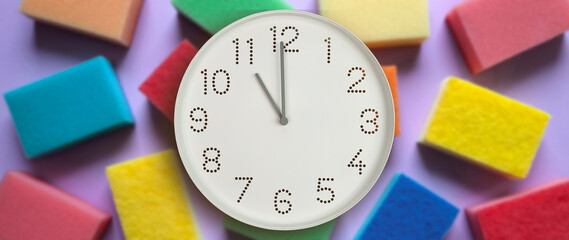 11 o'clock, morning. Cleaning time. Banner. White wall clock on background of kitchen sponges of...