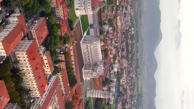 Pisa Cathedral and the Leaning Tower in Pisa, Italy. Cathedral with Leaning Tower of Pisa on Piazza dei Miracoli, Tuscany. vertical video